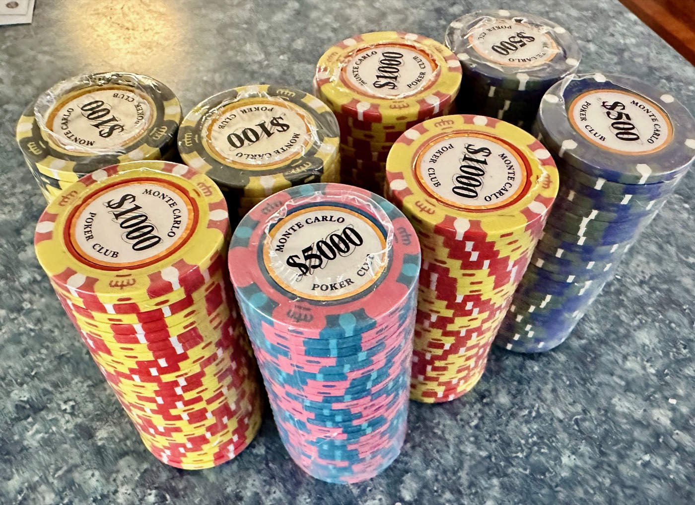 Stacks of Monte Carlo Poker Club clay chips